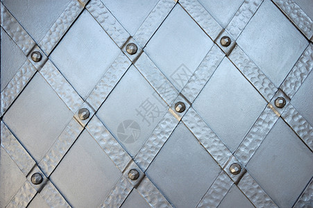 金属背景工业材料铆钉反射灰色宏观线条对角线背景图片