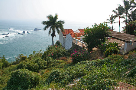 门控的奢华家庭财产社区班级富裕海岸线邻里海洋海岸房子窗户背景
