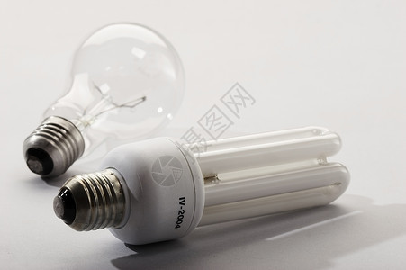 灯泡力量白色白炽灯静物电工概念灰色技术习惯性活力背景图片