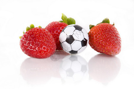 草莓和足球球背景图片