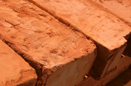 砖块石头红色积木建设性韧性平行体橙子倾覆团体桌子背景图片