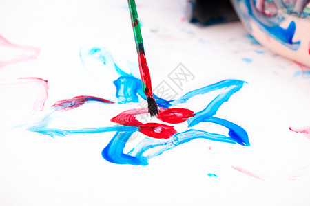星星画笔男孩绘画星星艺术宏观调色板红色蓝色画笔艺术家创造力想像力背景