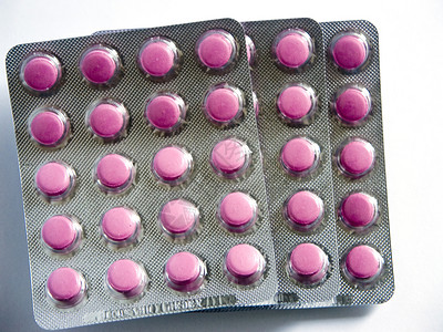 平板图健康圆形药品包装治疗药理药物粉色背景图片