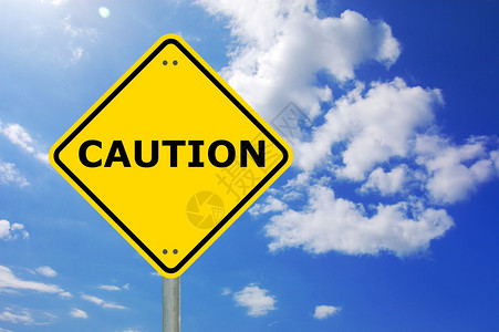 黄色警告符号路标蓝色安全成功商业交通危险警报注意力天空背景图片