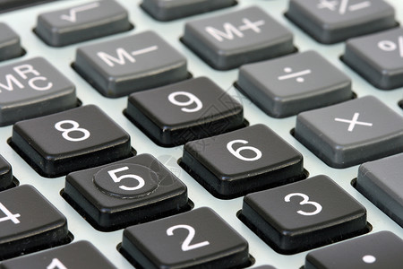 计算器键盘商业数字电子产品灰色纽扣金融会计白色数学技术背景图片