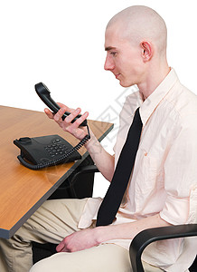电话和人机白色桌子戒指管子男人背景图片