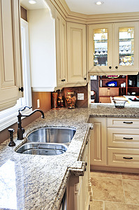 现代厨房内花岗岩摆设装修龙头装饰房子房间财产风格橱柜背景图片