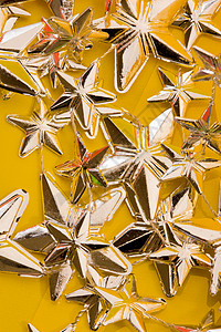 恒星背景花环星星黄色假期庆典新年背景图片