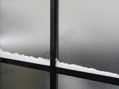 窗口边框上的雪背景图片