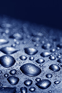 水滴口渴水分雨水雨滴圆圈飞溅宏观液体金属背景图片