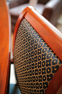 豪华的坐后绘画材料面料线条装潢椅子韵律优美桌子棕色背景图片