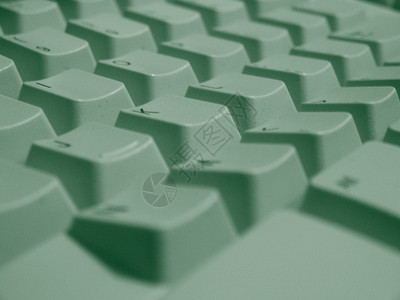 特写键盘键笔记本电脑商业钥匙按钮纽扣数字线条绿色字母背景图片