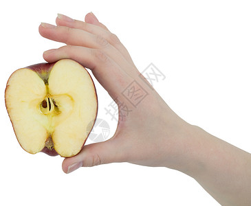 在女性手中切苹果背景图片