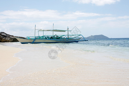 纯净海滩娱乐黑色蓝色情调假期水平摄影岩石明信片白色背景图片
