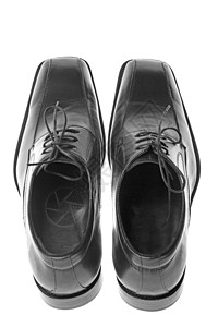 黑鞋子素材男人的黑鞋子抛光鞋带鞋类男士皮革商业产品背景