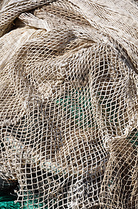 渔网捕鱼网绳索工具渔业缠绕海洋细绳背景图片