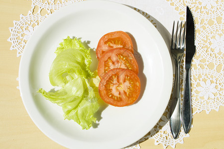 晒干西红柿沙拉桌面设置蔬菜美食叶子餐厅菜单食物环境植物背景