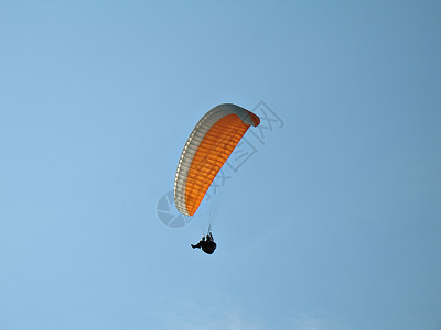 橙色滑坡降落伞危险天线活动天空冒险运动运动员自由爱好背景图片