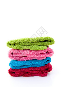 彩色的毛巾粉色奢华蓝色身体白色卫生折叠浴室棉布面巾背景图片