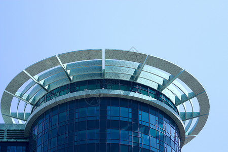 公司组织架构现代架构力量场景市中心阳光反射城市办公室蓝色摩天大楼窗户背景