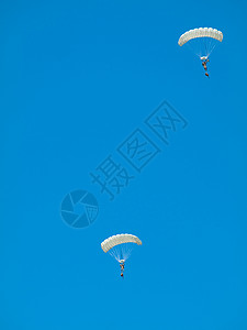 伞兵集团乐趣蓝色自由飞行跳伞男人团体运动团队空气背景图片