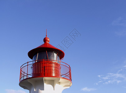 日德兰半岛灯塔支撑船运地标蓝色天堂导航天空海岸线海洋脚步背景