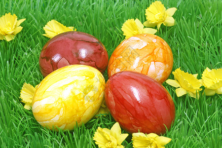复活节鸡蛋塑料花朵草地彩蛋传统背景图片