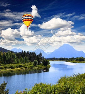热拉提大泰顿国家公园冒险蓝色旅行天空旅游运动国家公园空气游客背景