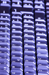 抽象暗黑键盘背景数字互联网技术工作蓝色桌子电脑密码按钮宏观背景图片