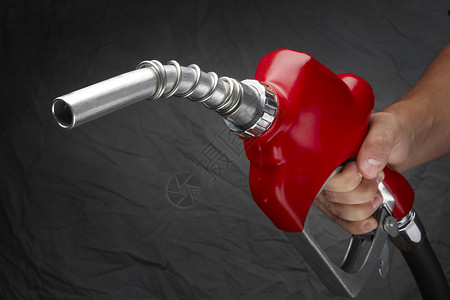 填充汽油软管活力男性气体喷嘴车站石油燃料环境背景图片