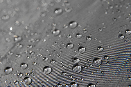 滴滴子科学宏观环境水分反射天气下雨灰色沉淀纺织品高清图片