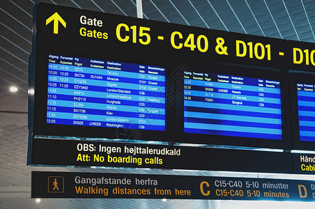 飞行情报栏走廊通勤者商业人士车站行人商务飞机旅行运输背景图片