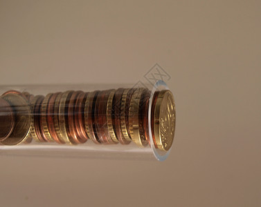 钱带透明素材管内硬币背景