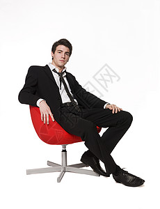 红臂椅男子人士时间工作室红色套装失误领带男生扶手椅男性背景图片