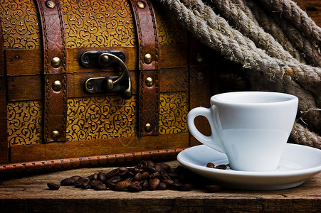海盗藏宝箱蕾丝木板咖啡飞碟胸部旅行绳索宝藏杯子背景图片