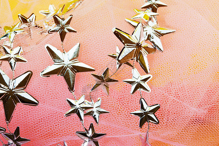 恒星粉色假期新年花环庆典星星背景图片