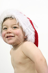 圣诞节微笑乐趣帽子季节假期孩子们男孩们男生欢乐喜悦幸福背景图片