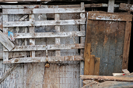 板绘建筑木木谷仓小屋建筑宏观风化废弃贫民窟木板废墟木头垃圾背景
