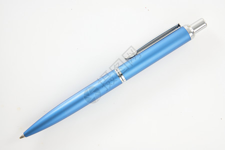 白色钢笔与世隔绝的金属钢笔签名圆珠笔乐器大学工具工作学校奢华蓝色对角线背景