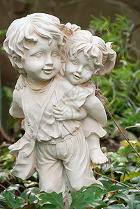 处女和孩子男孩和女孩的雕刻背景