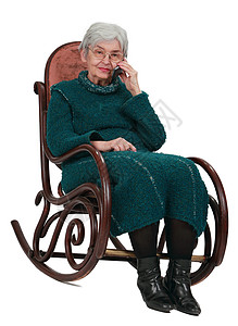 打电话的老女人灰色退休讲话微笑技术手机讨论女士老年椅子背景图片