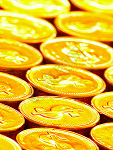 金币巧克力金币金属筹码繁荣金子宝藏巧克力食物糖果财富投资背景