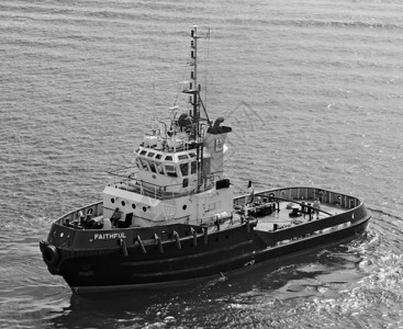 可信的拖船海军血管黑色工人工业船舶船只海域白色船运背景