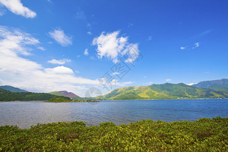 沙头角沿海景观闲暇全景热带悬崖蓝色港口旅行海洋假期太阳背景