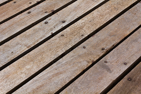 木板人行道甲板路面铺路材料同心宏观树干护套木头条纹背景图片