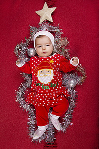 圣诞老人克劳斯圣诞新生儿婴儿孩子新生季节女孩红色星星假期姿势说谎快乐背景