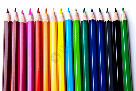 光背景的彩色铅笔彩虹说谎玻璃艺术家蓝色浅色红色艺术绘画背景图片