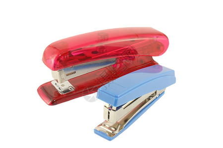 蓝色和红色主订书机工具文书学校绑定订书机金属白色工作办公室塑料背景图片