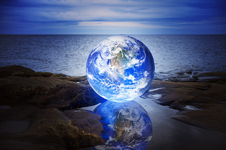我们的地球行星水坑环境发光辉光全球蓝色反射背景图片
