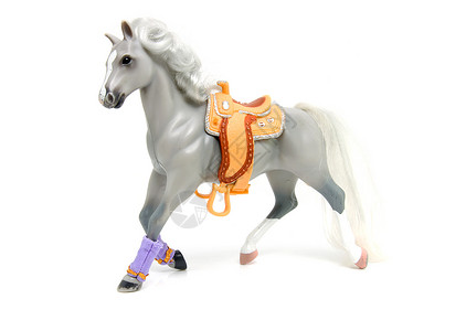 灰灰塑料玩具马动物灰色孩子们塑料孩子骑术背景图片